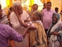 Monetary help to a poor old woman